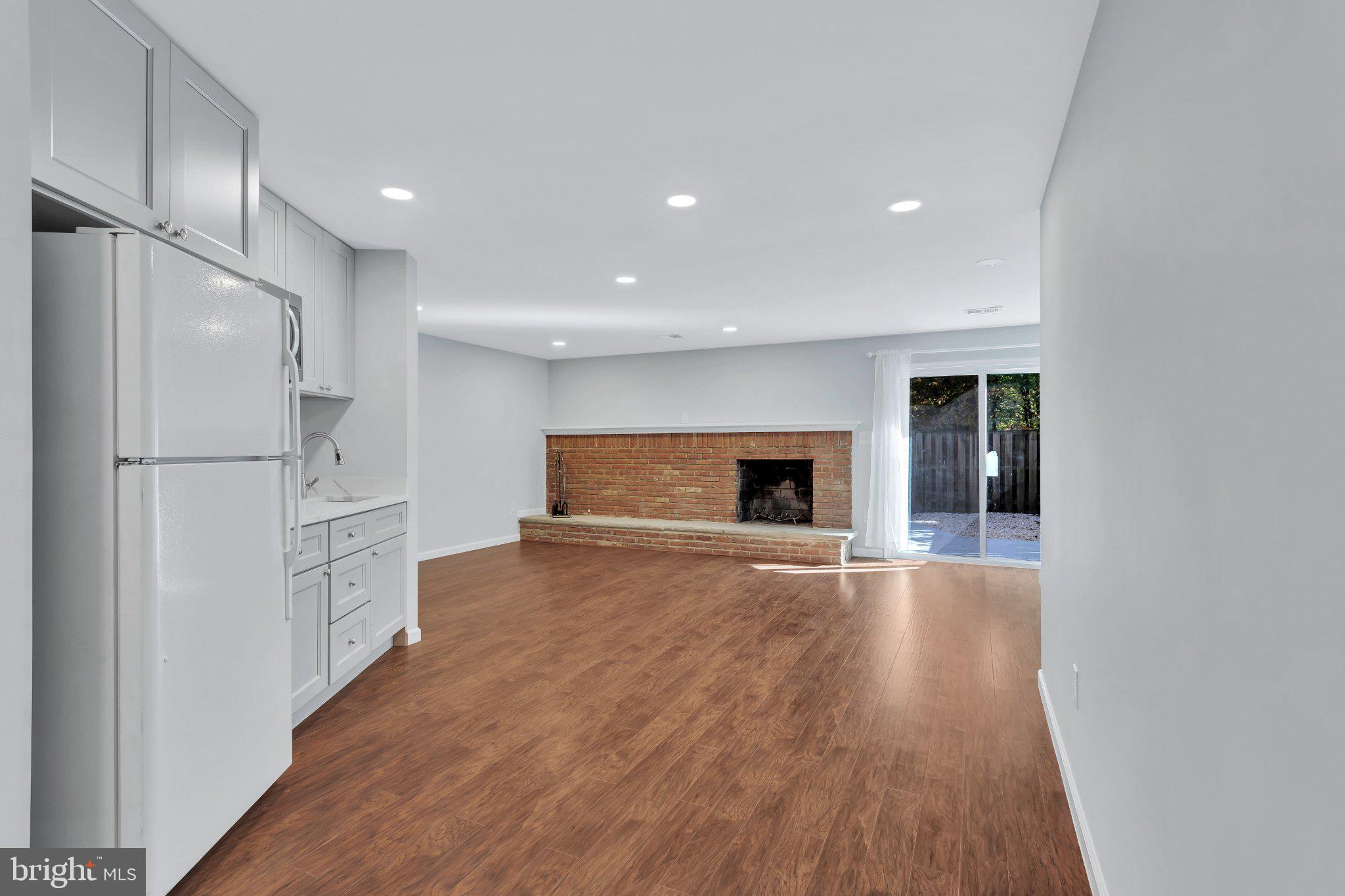 9009 Sweet Birch Court Springfield, VA 22152 - Photo 26 of 34 Spacious living area with natural light.