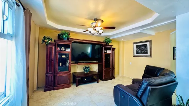 a kitchen with granite countertop a stove and a microwave