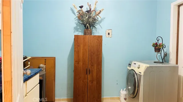 a view of a chairs and table in a balcony