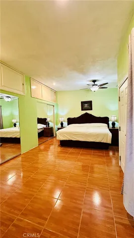 a bathroom with a sink vanity mirror and toilet