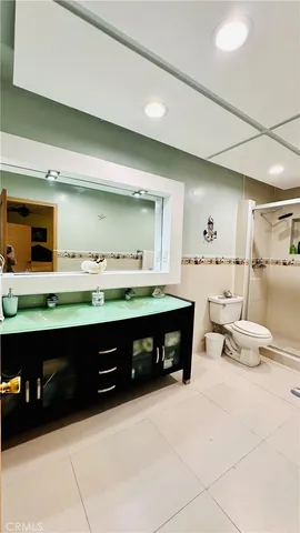 a view of an empty room with windows