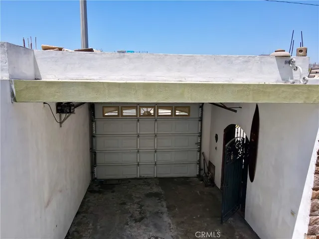 a view of kitchen with refrigerator stove and microwave