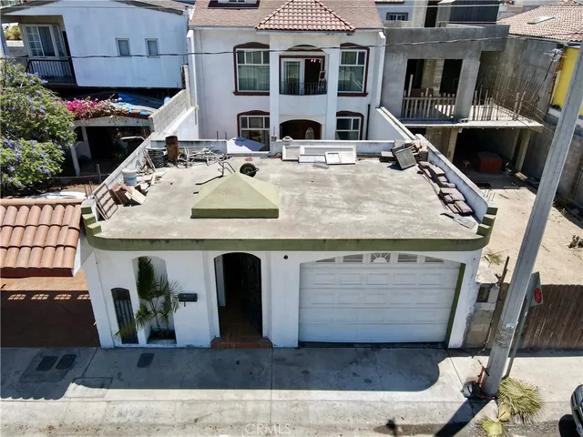 a view of a chairs and tables in a patio