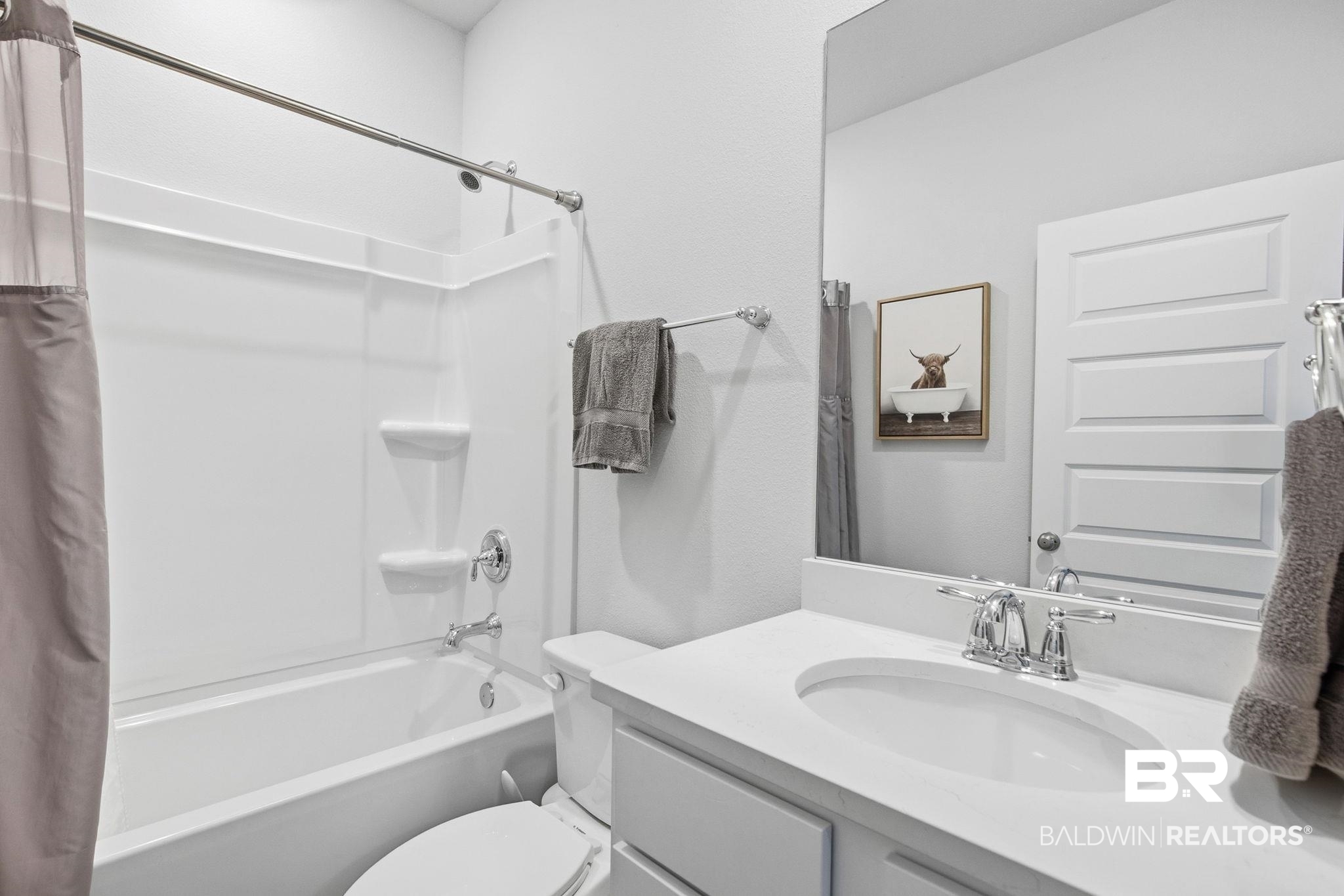 11123 Genuine Risk Circle Daphne, AL 36526 - Photo 42 of 67 Bathroom featuring vanity and shower / bathtub combination with curtain