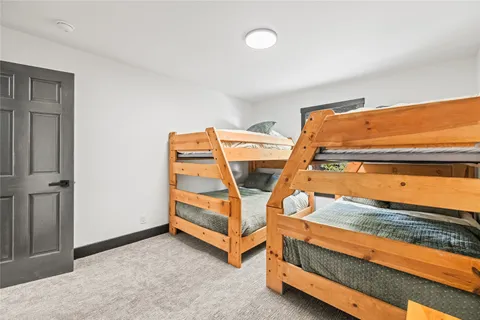 a view of room with wooden floor