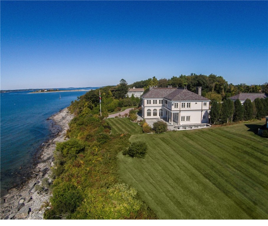 Luxury on the waterfront. Steps down to sandy beach.