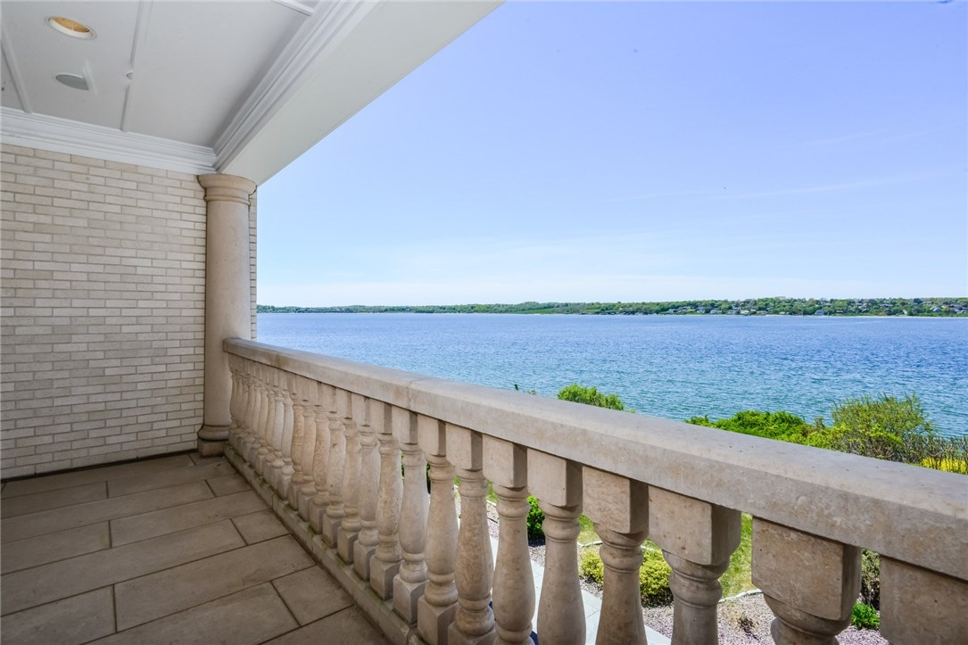 137 High Hill Road Tiverton, RI 02878 - Photo 24 of 39 The master bedroom has two stone balconies, both facing the water.