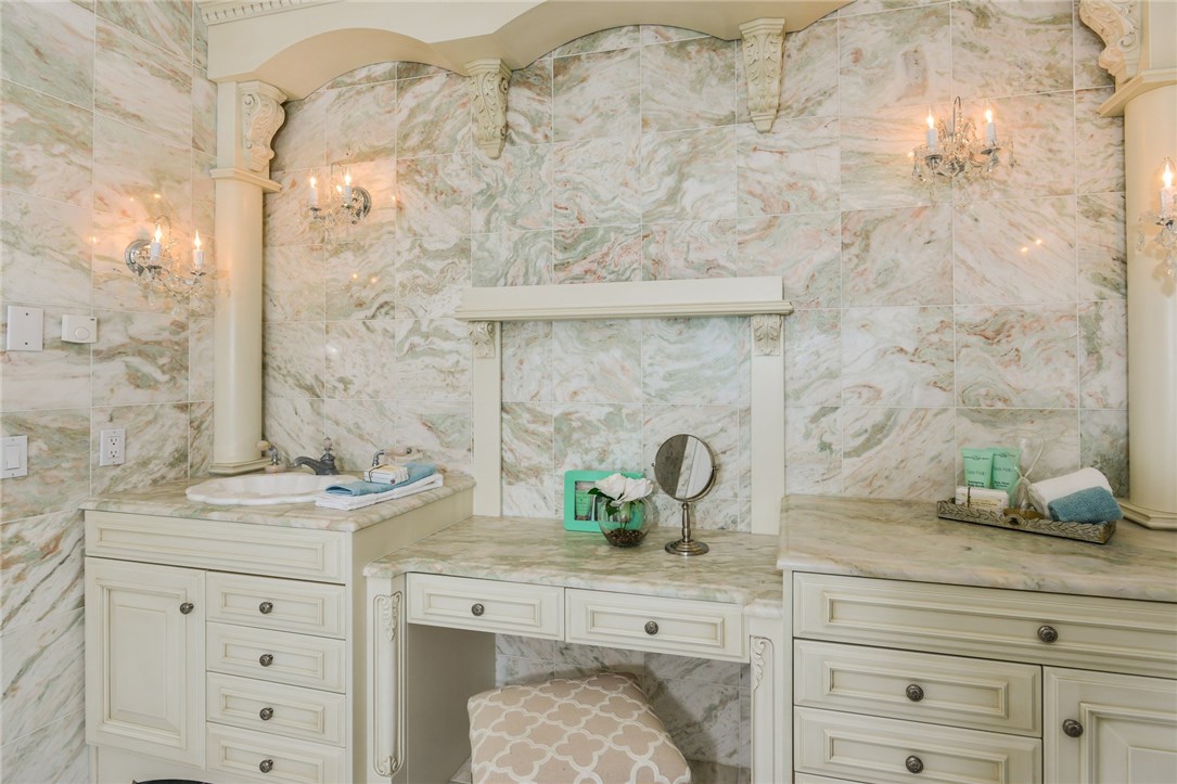 137 High Hill Road Tiverton, RI 02878 - Photo 27 of 39 The dressing table and storage in the all marble master bath.