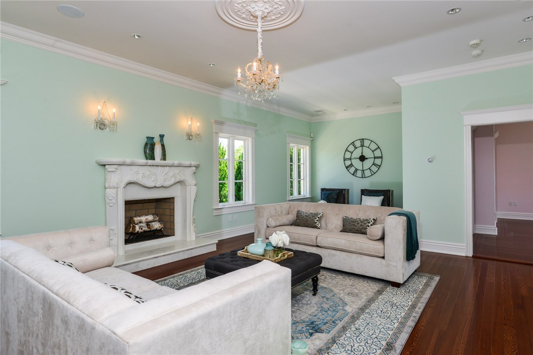 137 High Hill Road Tiverton, RI 02878 - Photo 30 of 39 There is a large family room or den on the second level of the home, also. It contains a marble fireplace, hand-carved in Italy.