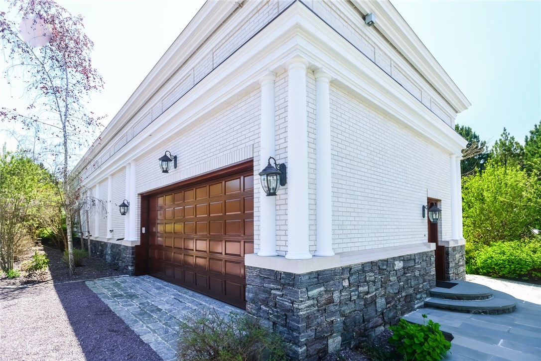 137 High Hill Road Tiverton, RI 02878 - Photo 37 of 39 The oversized garage and boat storage building. It will house a 40 foot boat as well as two or up to 8 cars. The building has water from its own dedicated well.