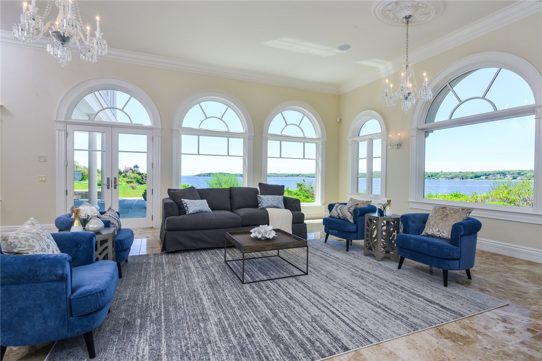 137 High Hill Road Tiverton, RI 02878 - Photo 9 of 39 The Marvin windows with curved upper transoms provide ever-changing views of both sea and sky. Really stunning!