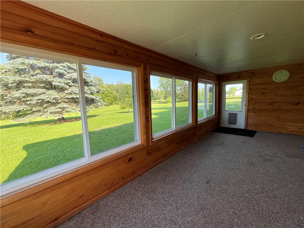 6796 E Port Wolcott, NY 14590 - Photo 35 of 50 Rear enclosed porch overlooking the beautiful yard