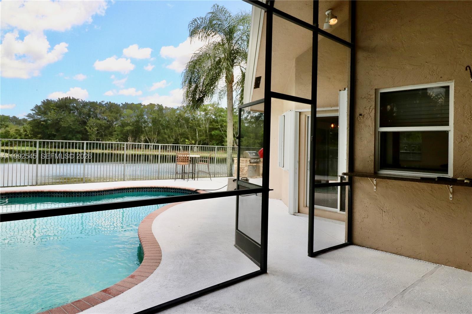 2686 Palmer Place Weston, FL 33332 - Photo 12 of 42 Open Bar from the kicthen