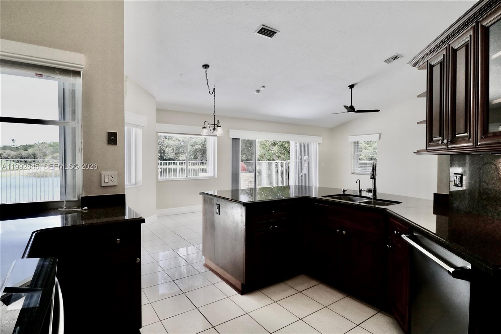 2686 Palmer Place Weston, FL 33332 - Photo 22 of 42 Around the kitchen, breakfast nook, family