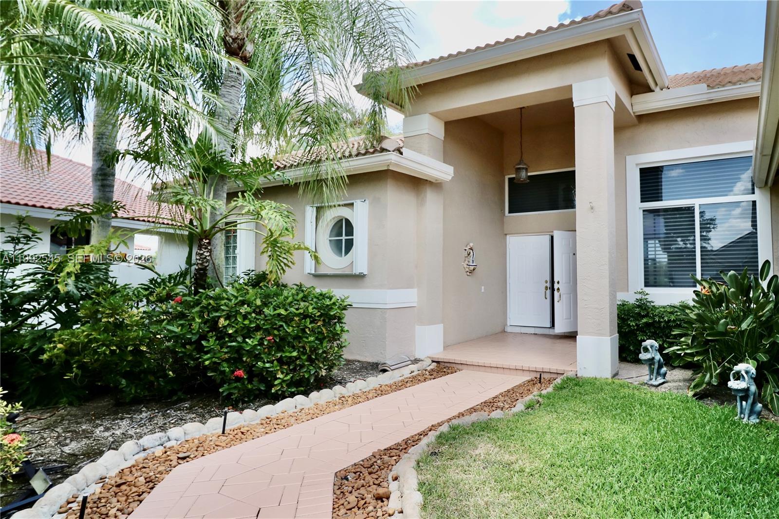 2686 Palmer Place Weston, FL 33332 - Photo 5 of 42 House front view
