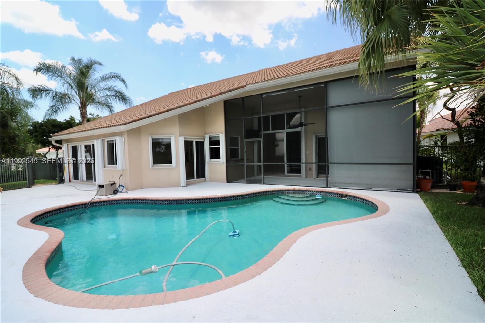 2686 Palmer Place Weston, FL 33332 - Photo 7 of 42 house back vew
