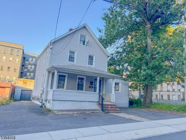 a front view of a house with a garage