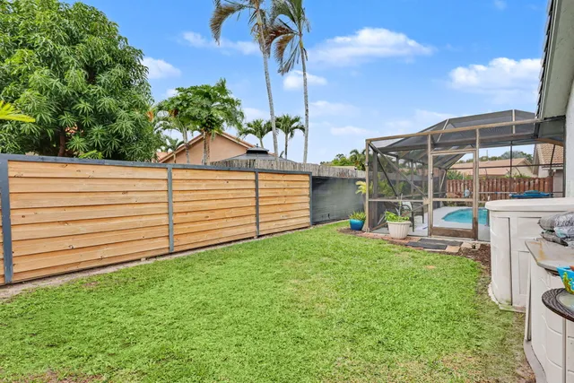 a house view with a garden space