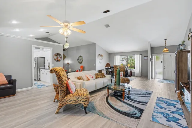 a kitchen with a sink stove and refrigerator