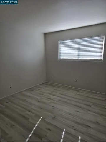 a view of a room that has a window in it