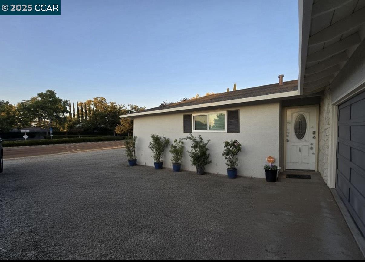 4340 Balfour Road Brentwood, CA 94513 - Photo 3 of 21 a view of a house with a yard