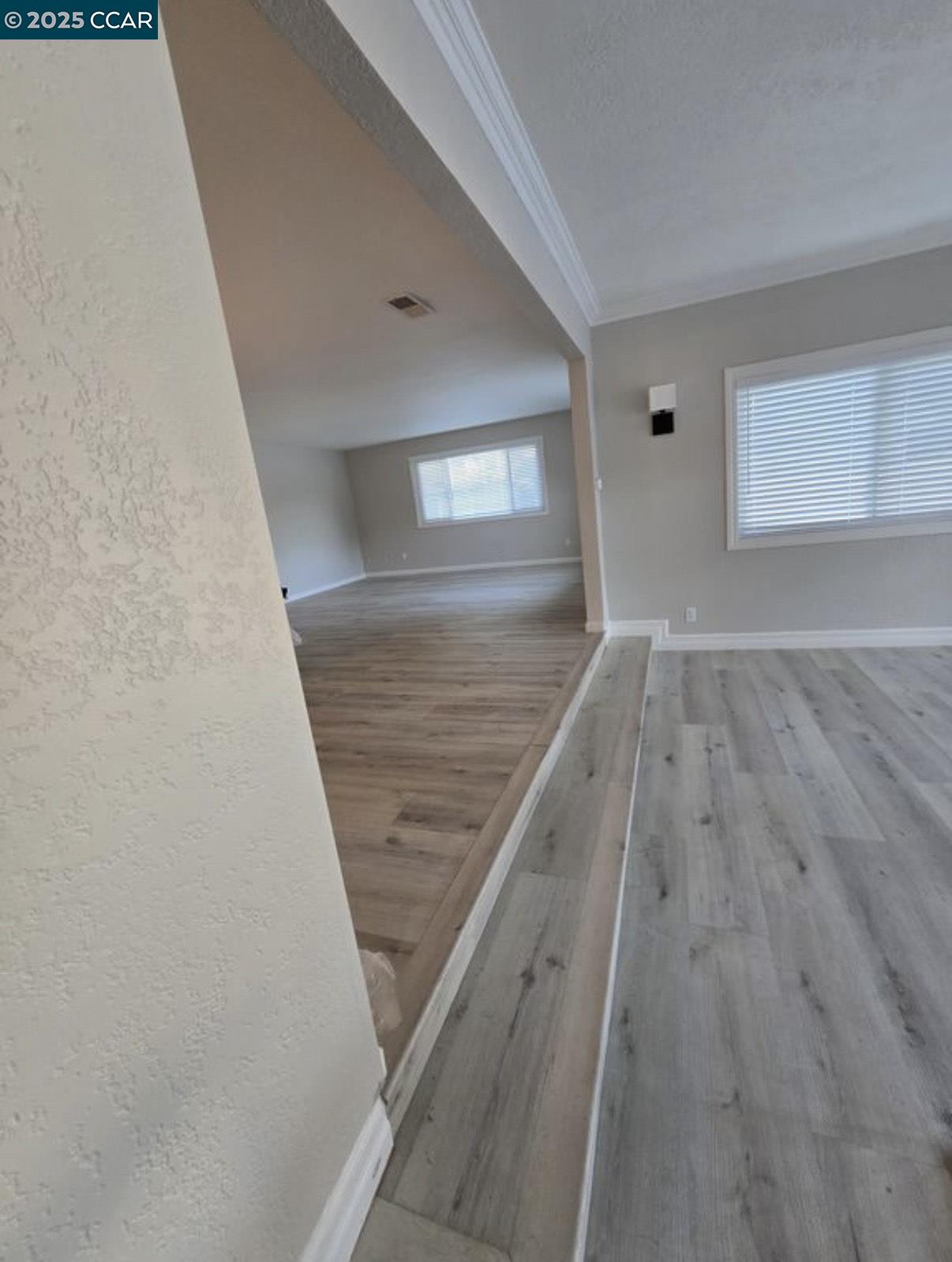 4340 Balfour Road Brentwood, CA 94513 - Photo 7 of 21 wooden floor in a hall with an entryway