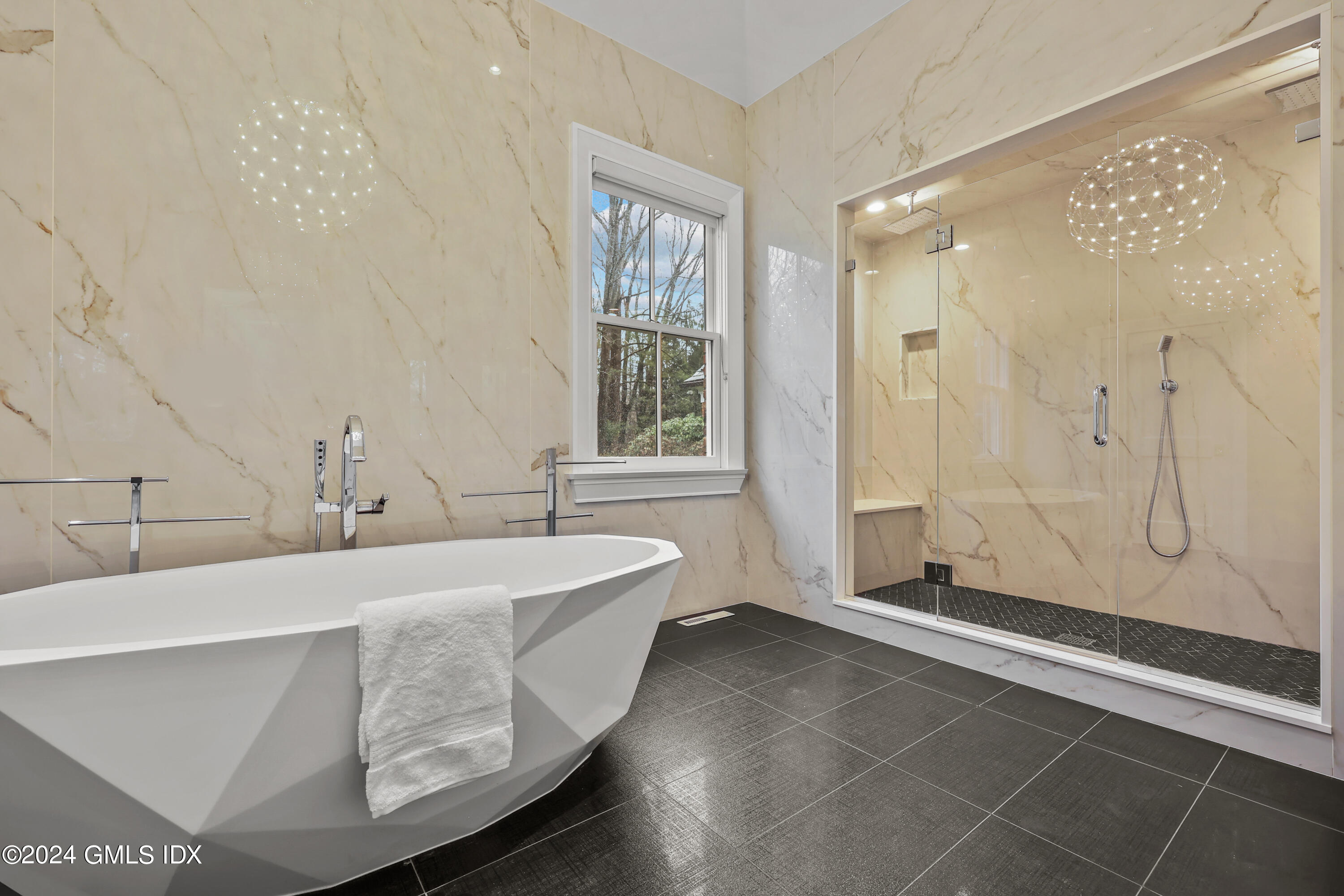 24 Highland Farm Road Greenwich, CT 06831 - Photo 17 of 34 a spacious bathroom with a tub shower and sink