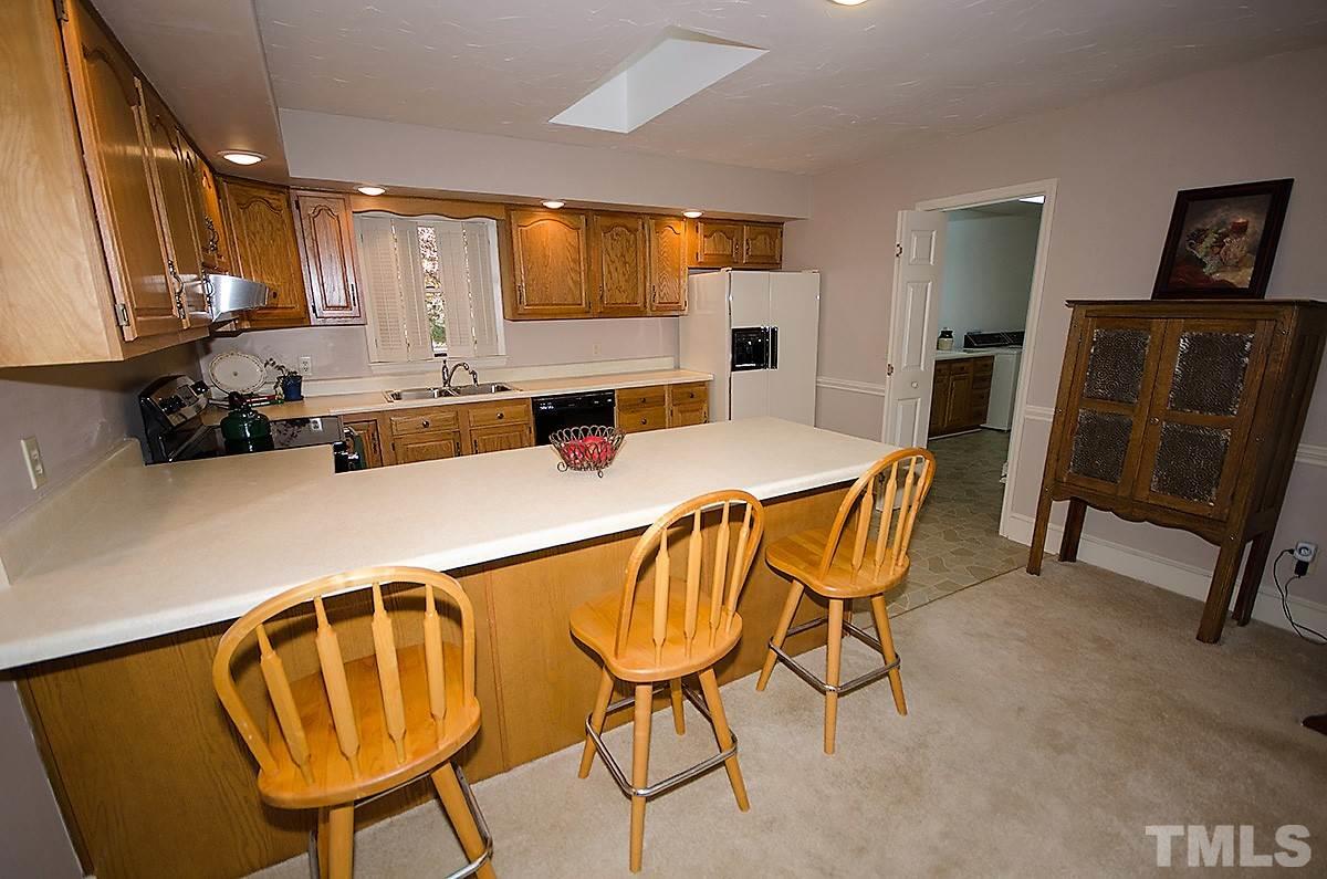 2176 Burlington Road Roxboro, NC 27573 - Photo 3 of 25 a view of a dining room with furniture