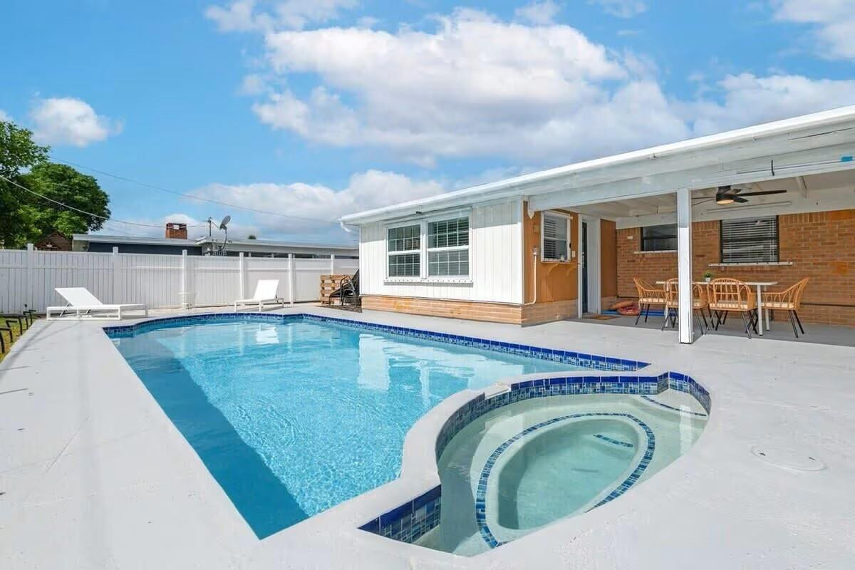 3762 Catalina Road West Palm Beach, FL 33410 - Photo 24 of 29 swimming pool with outdoor seating