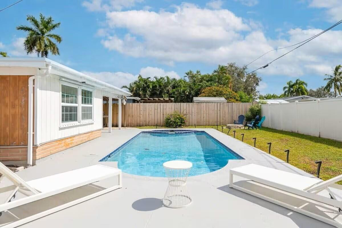 3762 Catalina Road West Palm Beach, FL 33410 - Photo 25 of 29 a view of swimming pool with seating space