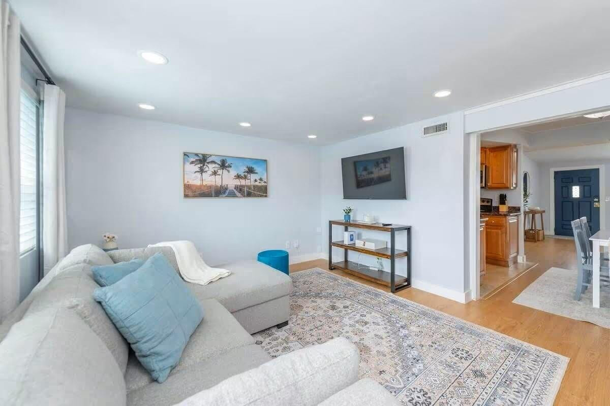 3762 Catalina Road West Palm Beach, FL 33410 - Photo 7 of 29 a living room with furniture and a wooden floor
