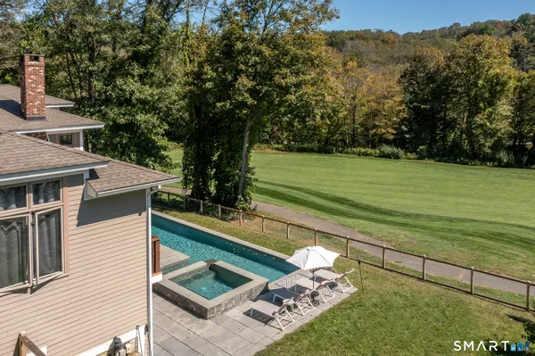 a view of a house with a yard balcony