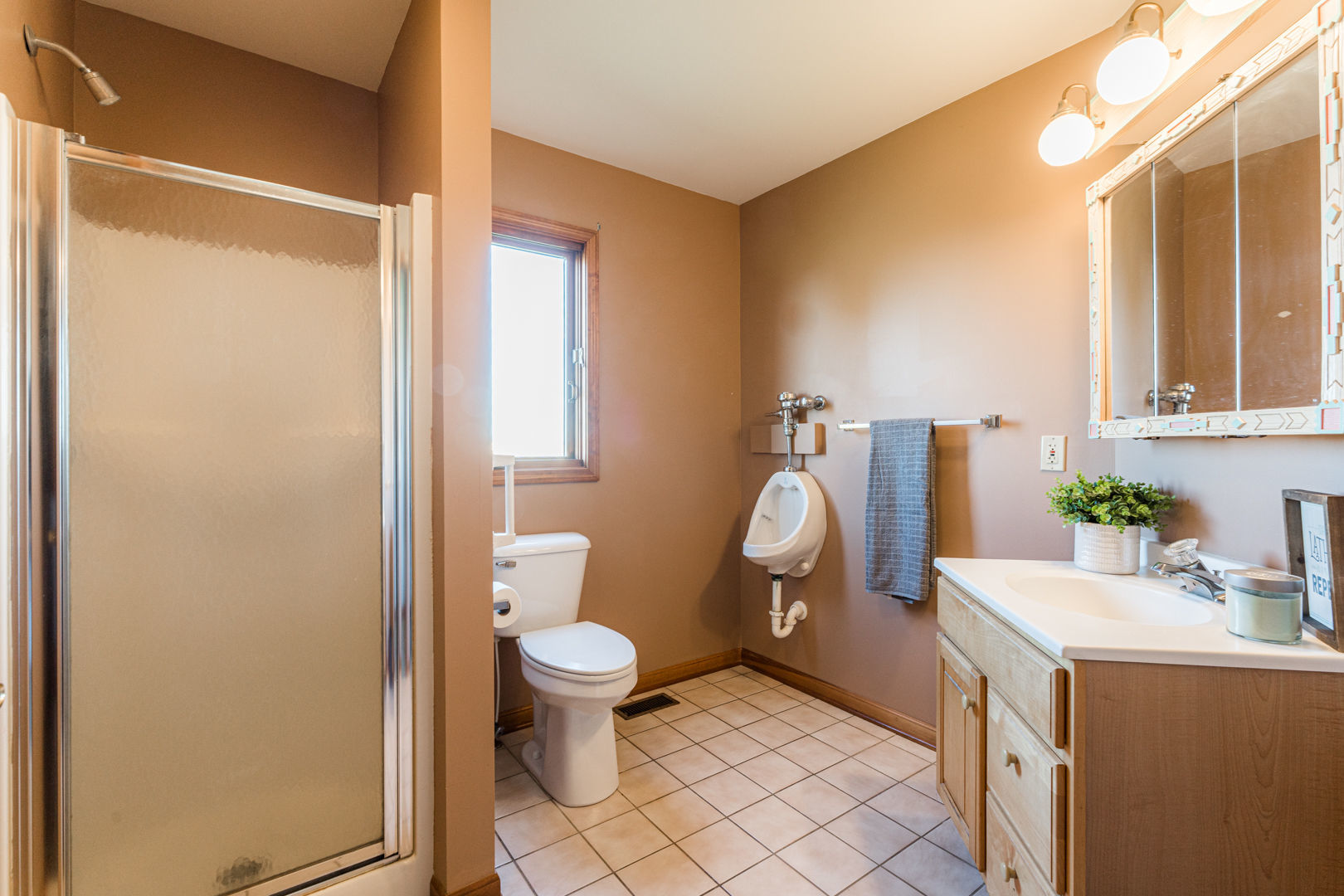 49W170 Lasher Road Big Rock, IL 60511 - Photo 25 of 33 a bathroom with a sink toilet and shower
