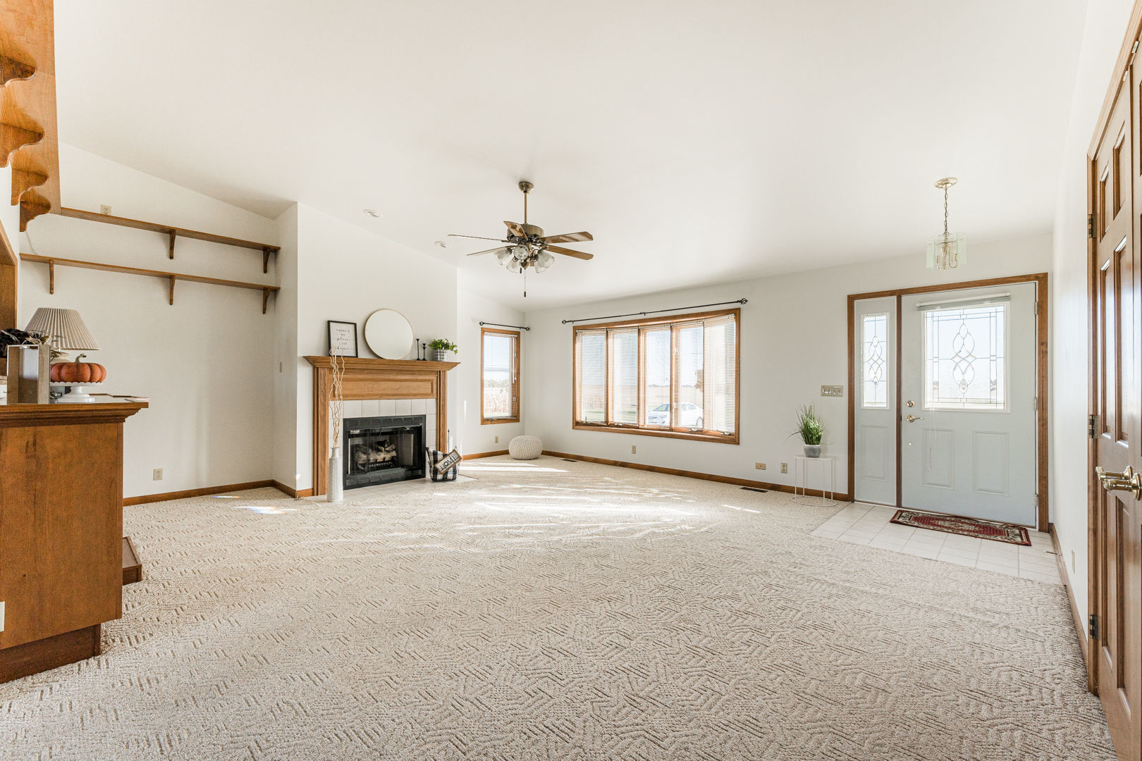 49W170 Lasher Road Big Rock, IL 60511 - Photo 8 of 33 an empty room with windows and fireplace