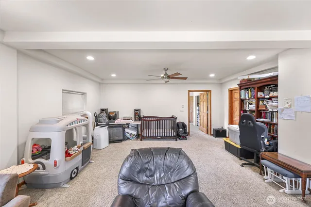 a living room with furniture and a tv