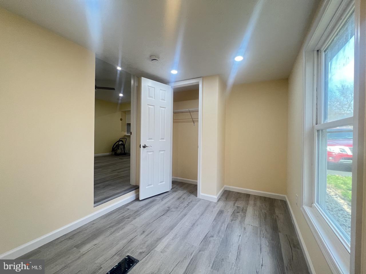 202 Mt Laurel Drive Ridgeley, WV 26753 - Photo 13 of 38 a view of hallway with livingroom and wooden floor