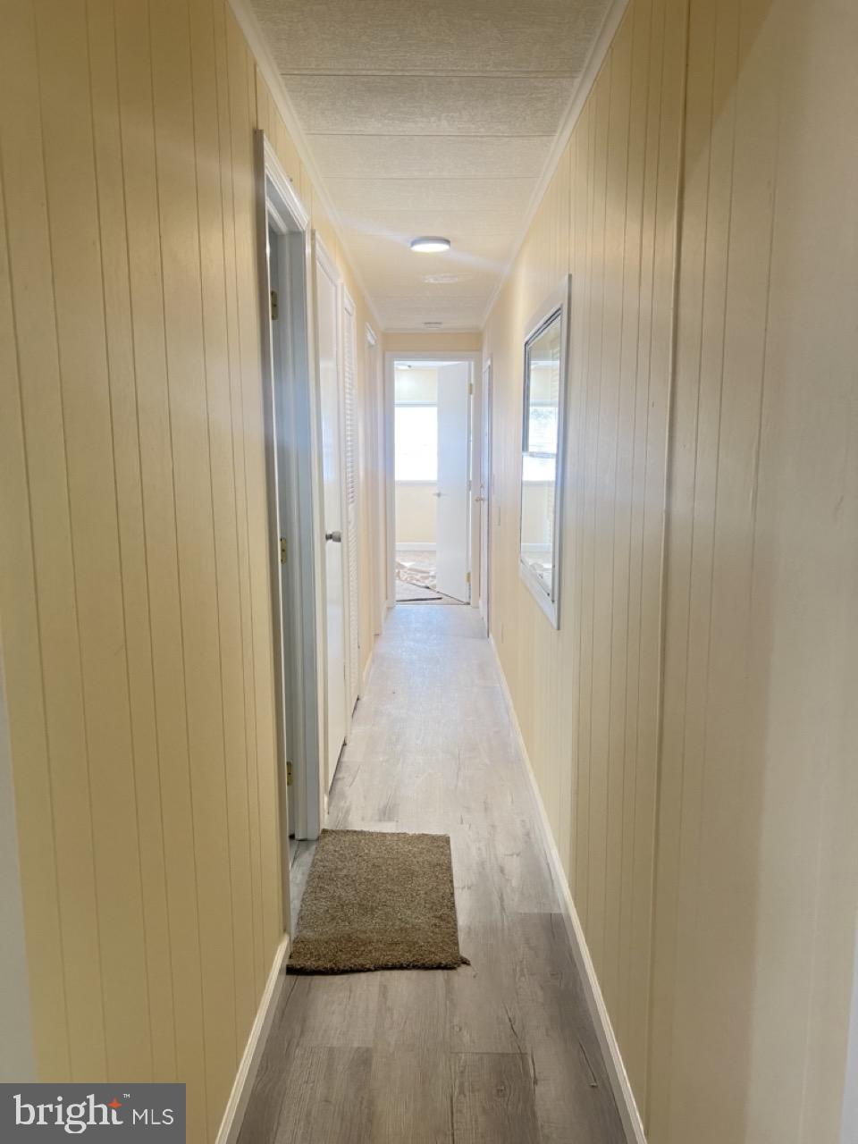 202 Mt Laurel Drive Ridgeley, WV 26753 - Photo 14 of 38 a view of a hallway with wooden floor
