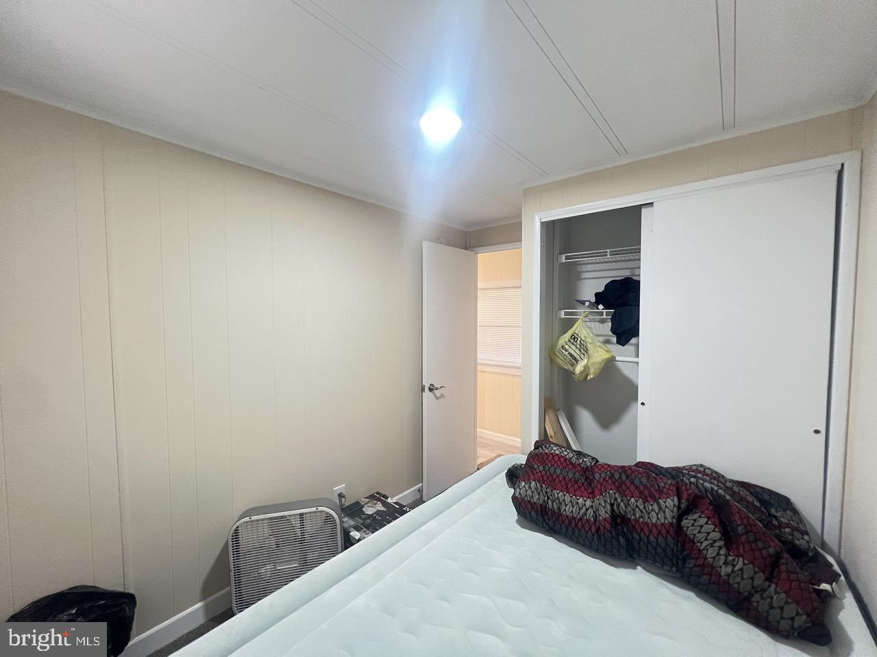 202 Mt Laurel Drive Ridgeley, WV 26753 - Photo 16 of 38 a bed room with a bed and a window