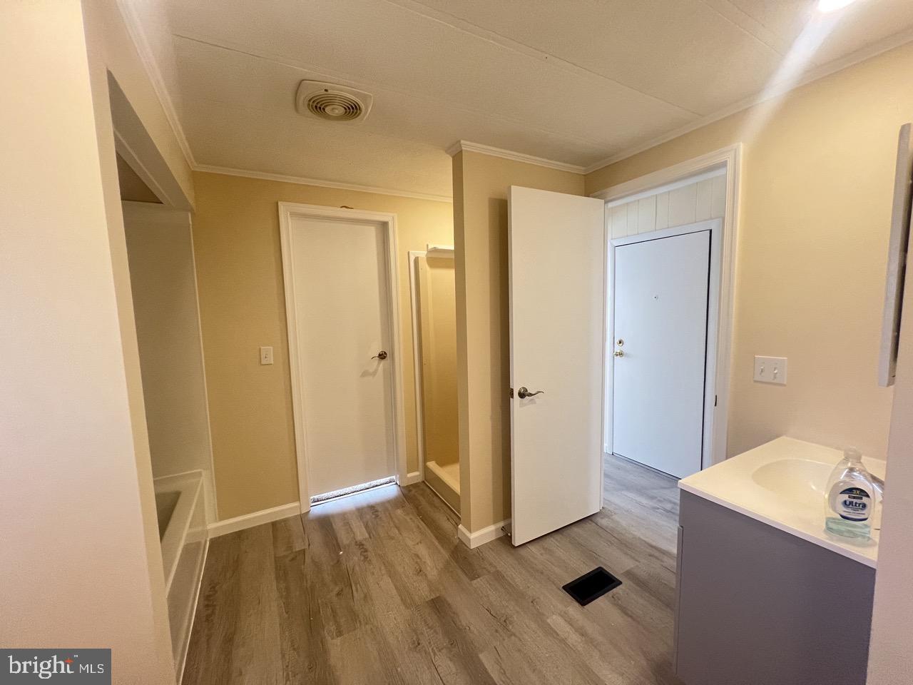 202 Mt Laurel Drive Ridgeley, WV 26753 - Photo 18 of 38 a view of hallway with wooden floor