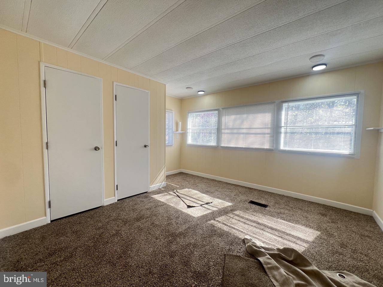 202 Mt Laurel Drive Ridgeley, WV 26753 - Photo 24 of 38 a view of wooden floor and windows in a room