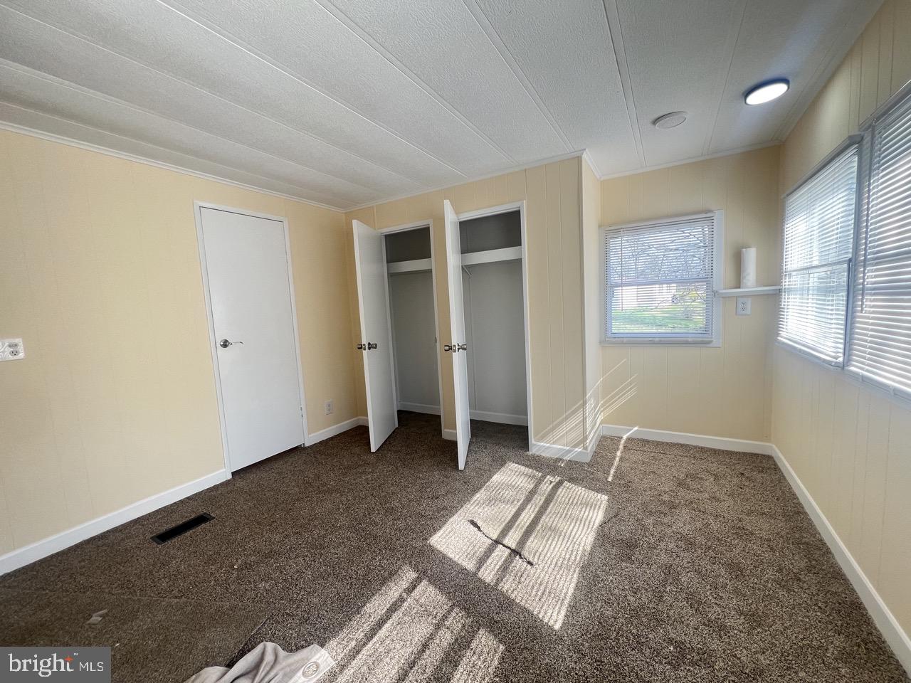 202 Mt Laurel Drive Ridgeley, WV 26753 - Photo 25 of 38 an empty room with windows