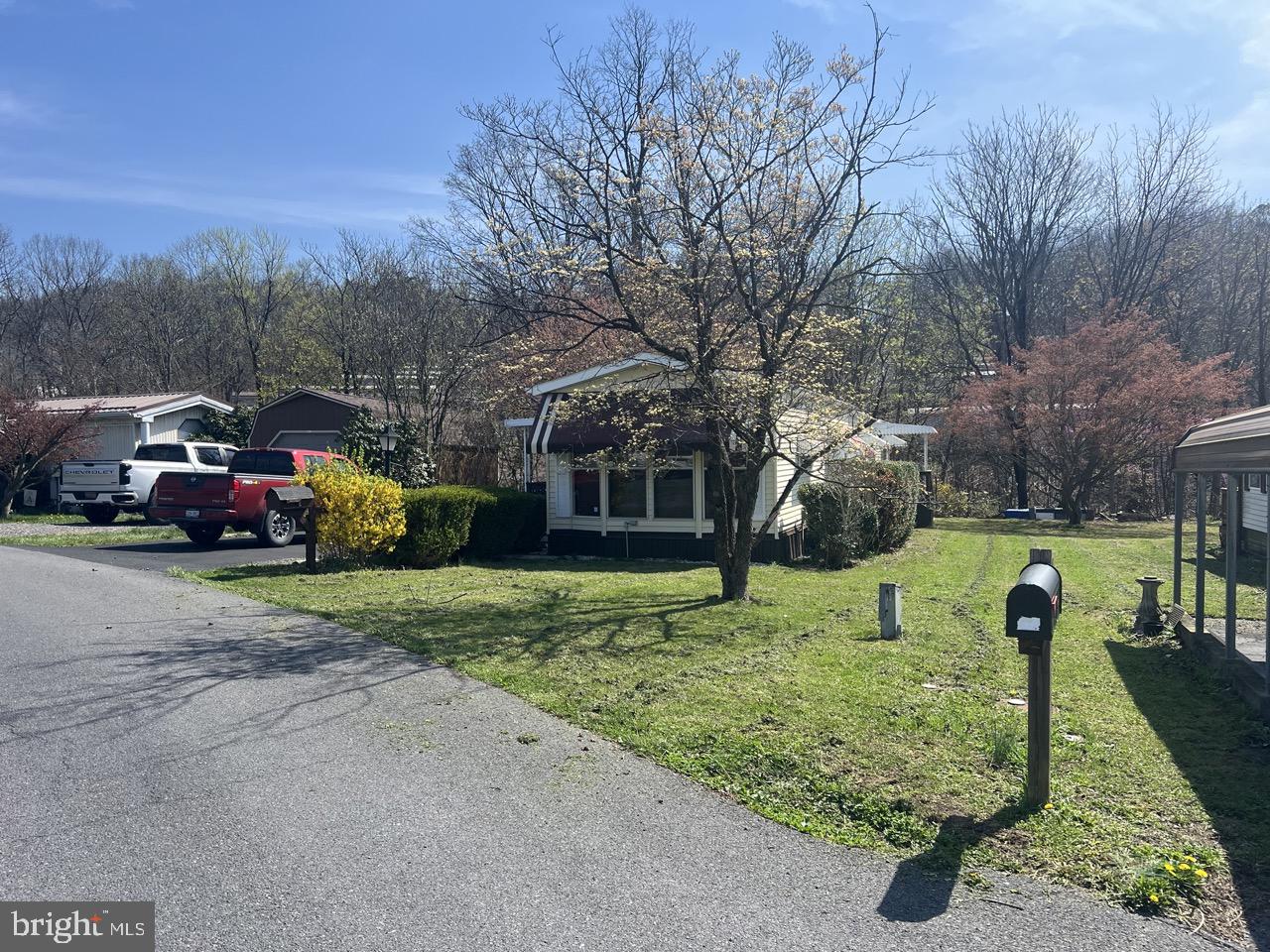 202 Mt Laurel Drive Ridgeley, WV 26753 - Photo 34 of 38 a house view with a garden space