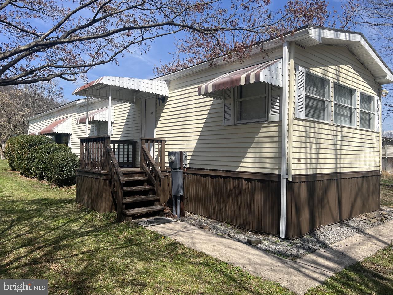 202 Mt Laurel Drive Ridgeley, WV 26753 - Photo 36 of 38 a view of a house with a wooden fence