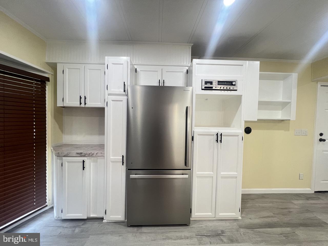 202 Mt Laurel Drive Ridgeley, WV 26753 - Photo 6 of 38 a white refrigerator freezer sitting in a kitchen
