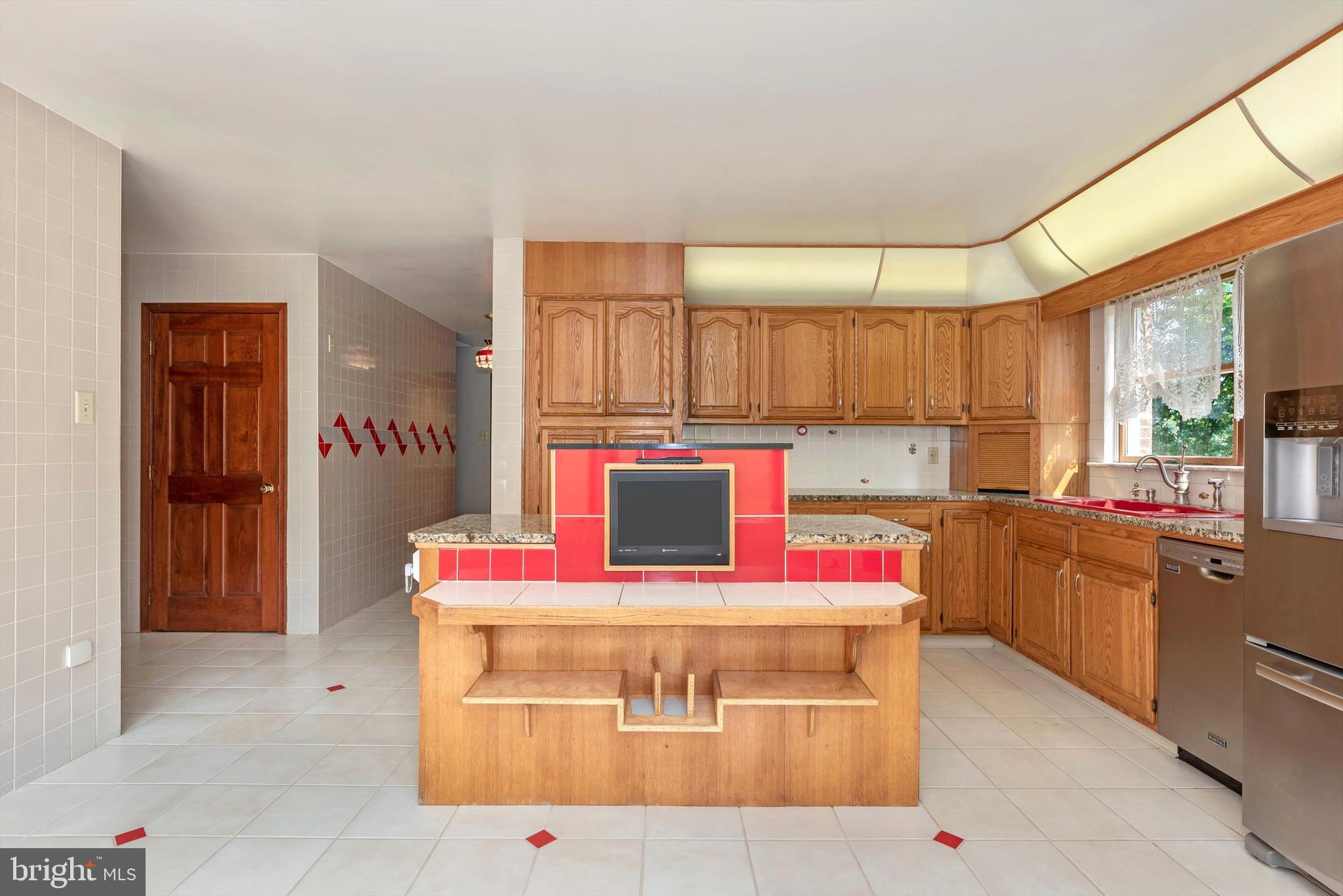 10760 Dublin Road Walkersville, MD 21793 - Photo 14 of 102 Kitchen island with built-in TV