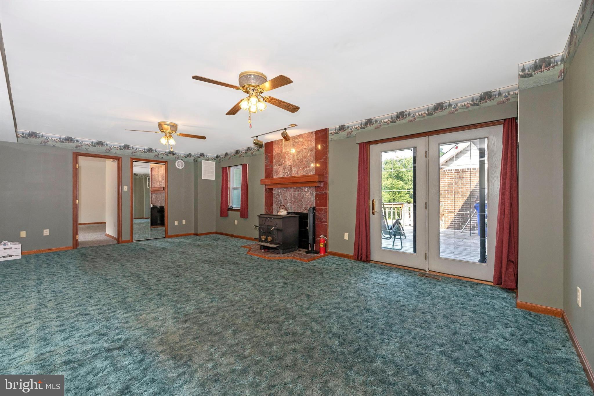 10760 Dublin Road Walkersville, MD 21793 - Photo 20 of 102 Large FR with wood stove and french doors