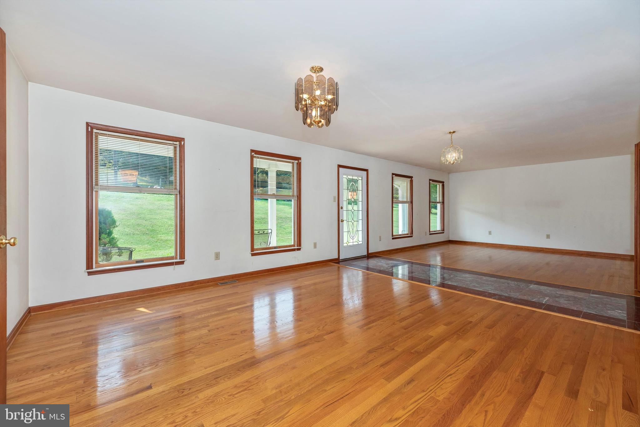 10760 Dublin Road Walkersville, MD 21793 - Photo 10 of 102 Dining Room & Living Room with hardwood floors