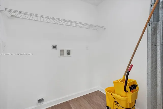 a view of house with a garden and pathway