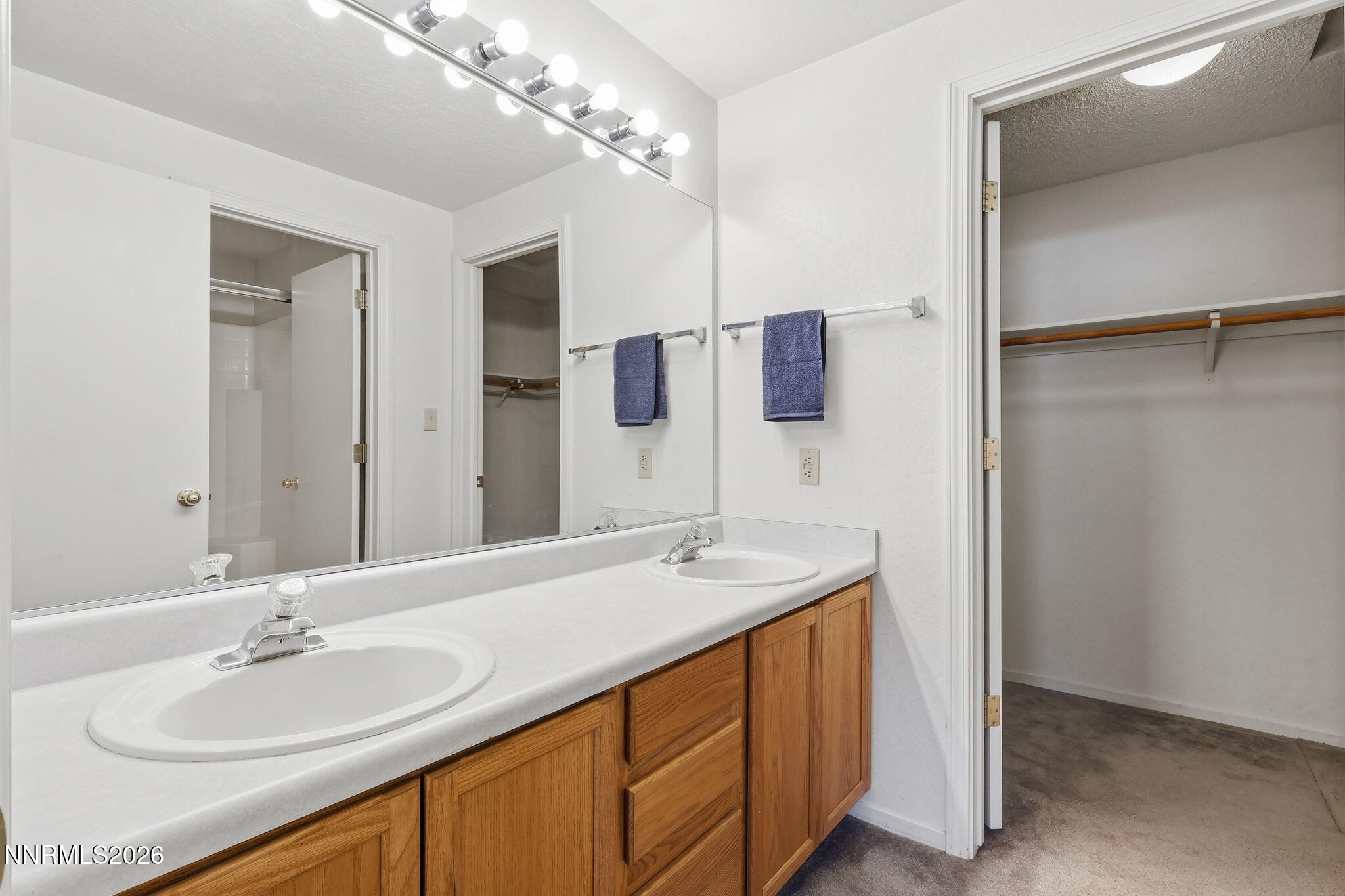 6840 Viscaya Court Reno, NV 89523 - Photo 20 of 25 a bathroom with a sink double vanity and a mirror