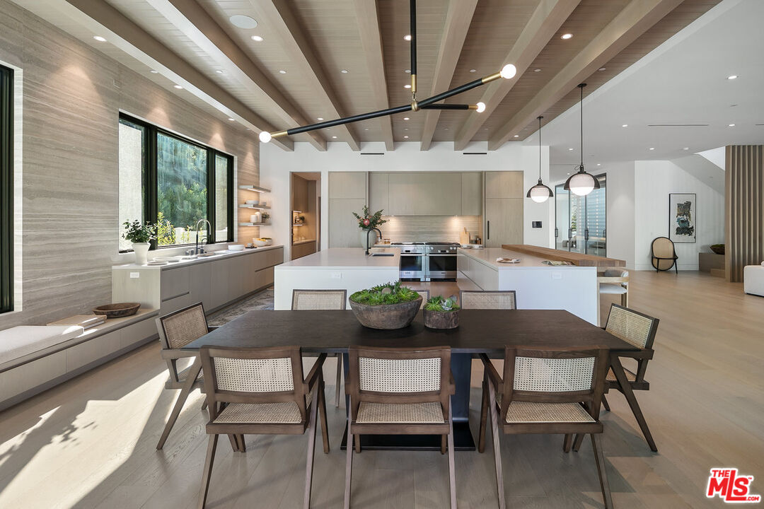 5376 Round Meadow Road Hidden Hills, CA 91302 - Photo 7 of 31 a view of a dining room with furniture window and outside view